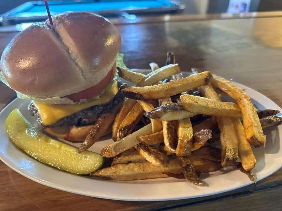Stacked burger with fries